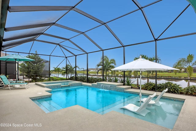 view of swimming pool featuring a lanai, pool water feature, an in ground hot tub, a water view, and a patio