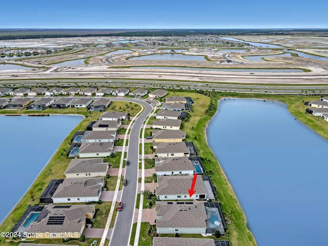 drone / aerial view featuring a water view