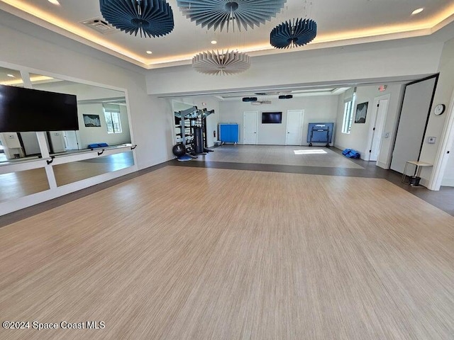 gym featuring hardwood / wood-style flooring