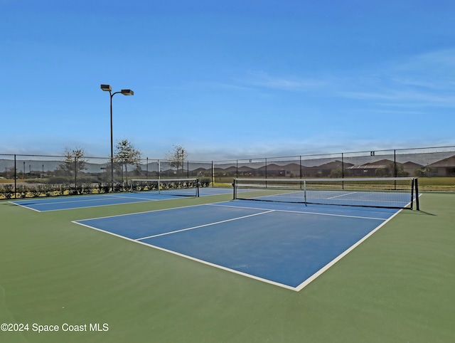 view of sport court featuring basketball court