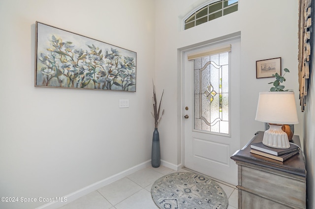 entryway featuring light tile patterned floors