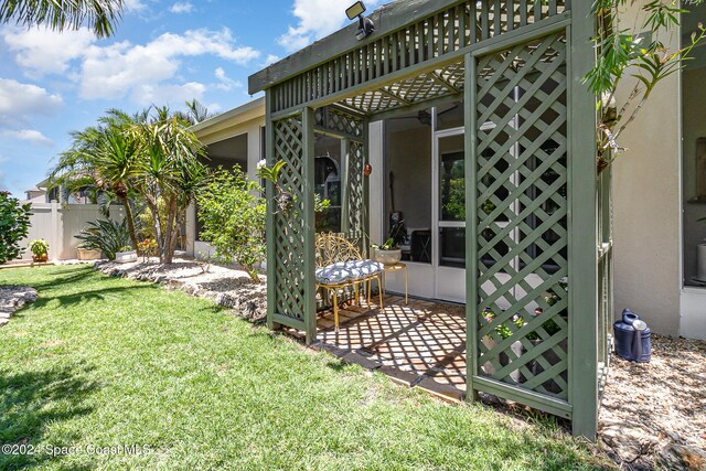 view of yard featuring a sunroom