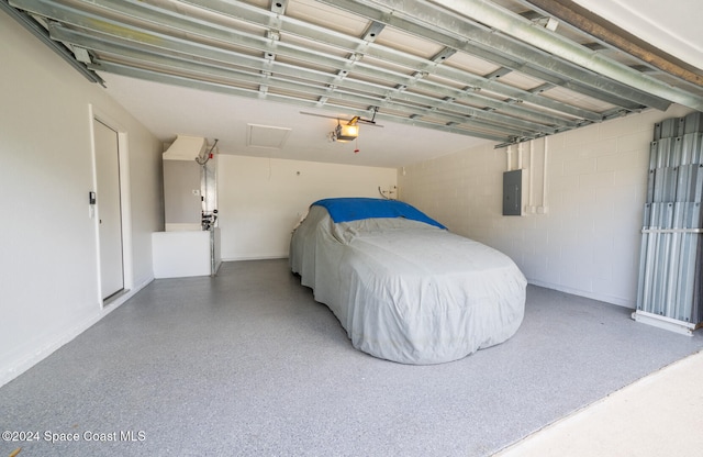 garage with electric panel and a garage door opener