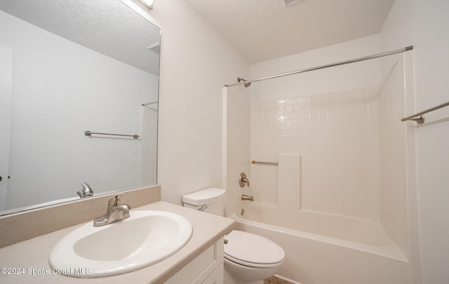 full bathroom featuring vanity, shower / bathtub combination, toilet, and a textured ceiling