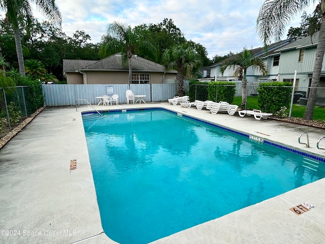 view of pool with a patio