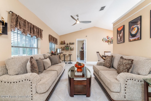 living room featuring light tile patterned floors, ceiling fan, and lofted ceiling