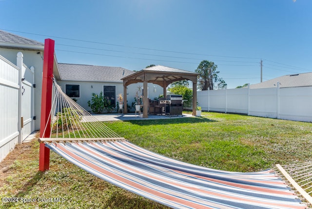 view of yard featuring a gazebo and a patio