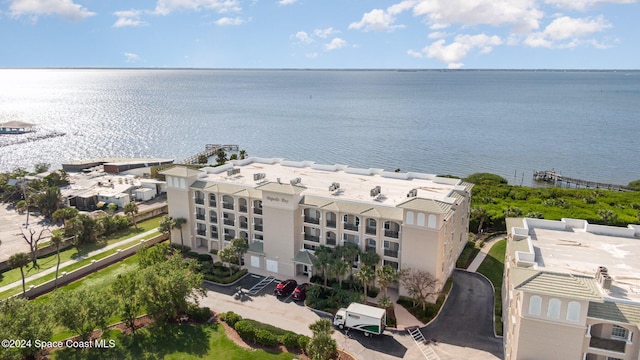 drone / aerial view with a water view