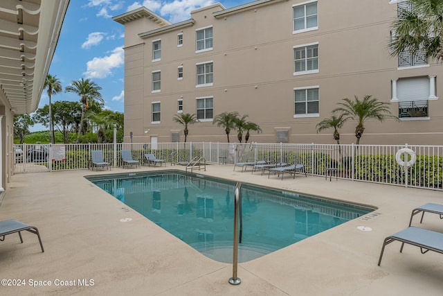 view of pool featuring a patio area