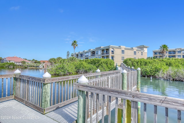 view of dock with a water view