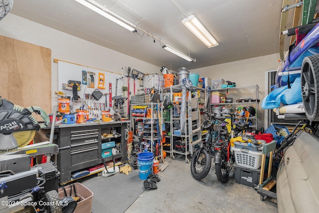 garage with a workshop area