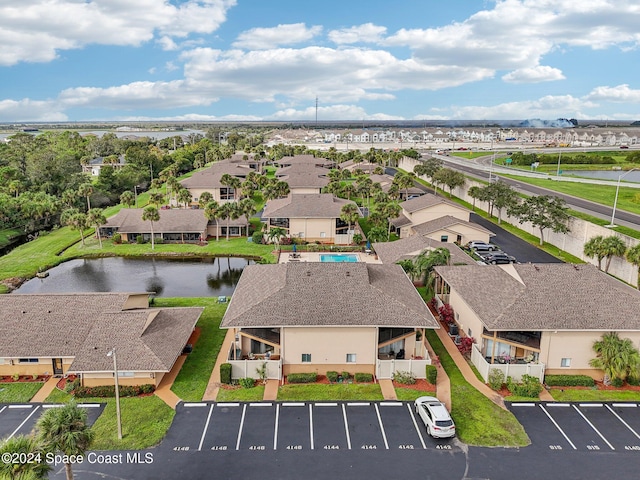 bird's eye view with a water view