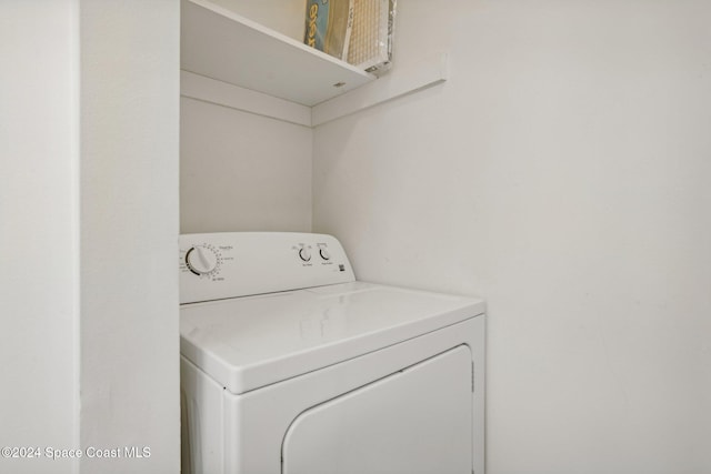 laundry area with washer / dryer