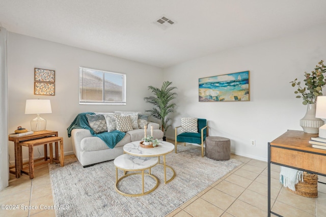 living room featuring light tile patterned flooring