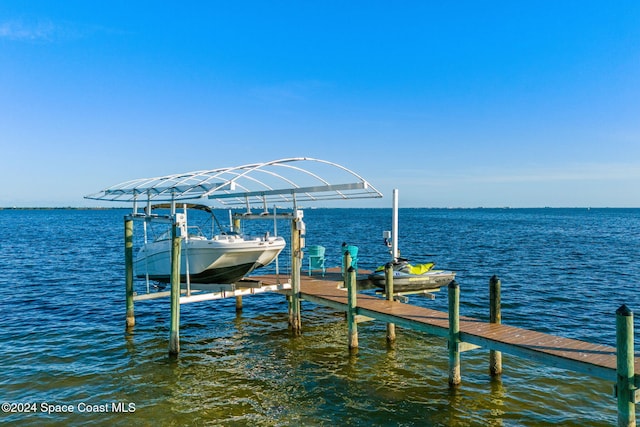 view of dock with a water view