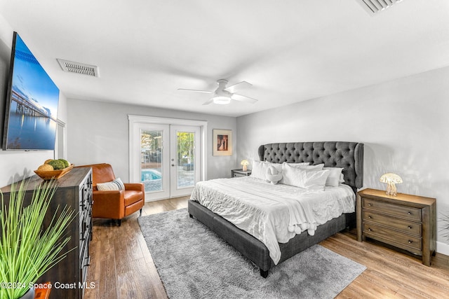 bedroom with hardwood / wood-style floors, ceiling fan, access to exterior, and french doors