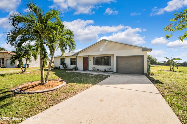 ranch-style house with a front yard and a garage