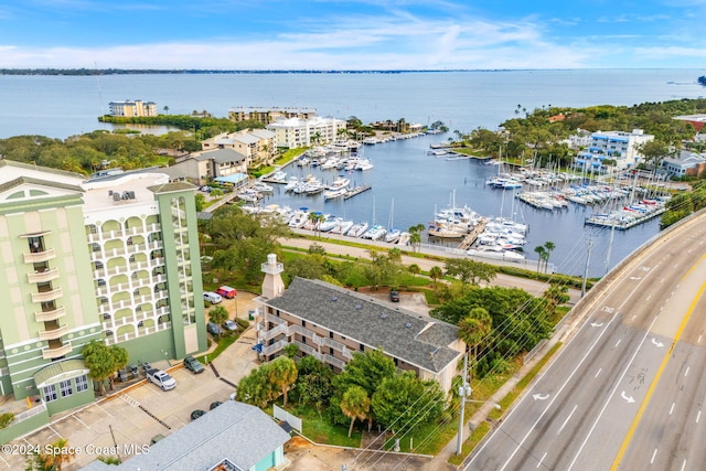 birds eye view of property featuring a water view