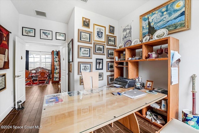 home office featuring dark hardwood / wood-style flooring