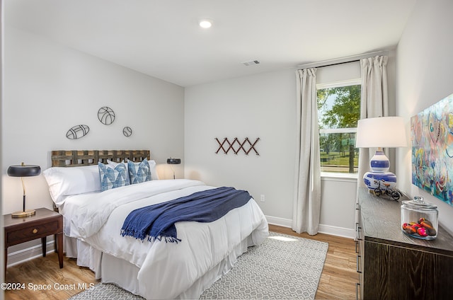 bedroom featuring light wood-type flooring