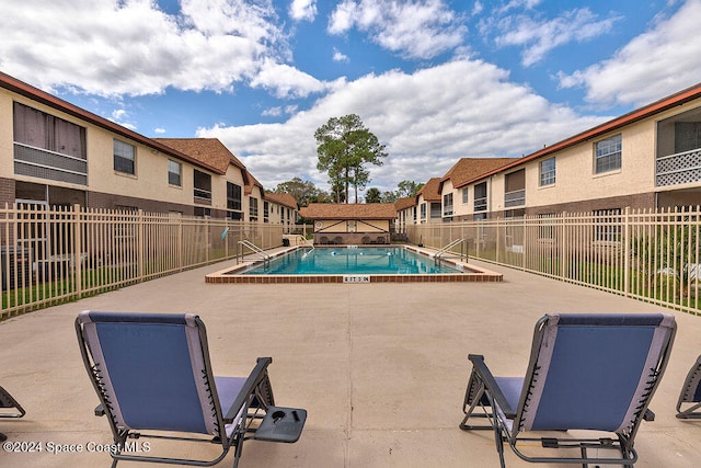 view of pool with a patio area