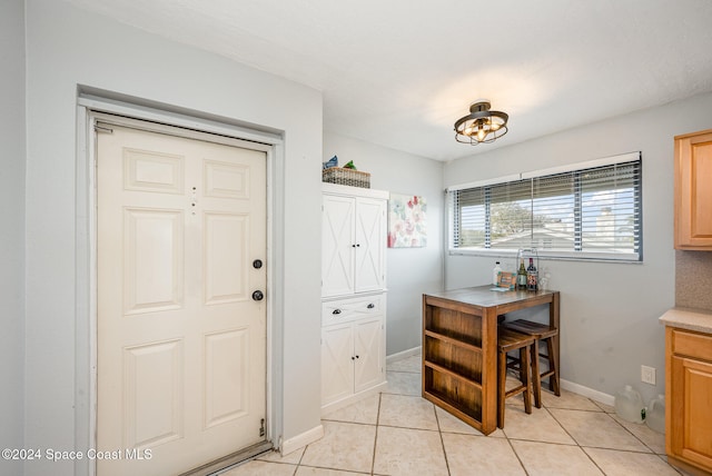 washroom featuring light tile patterned floors