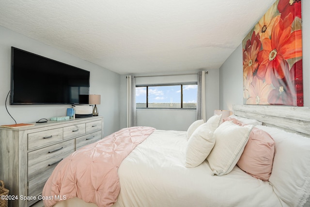 bedroom with a textured ceiling