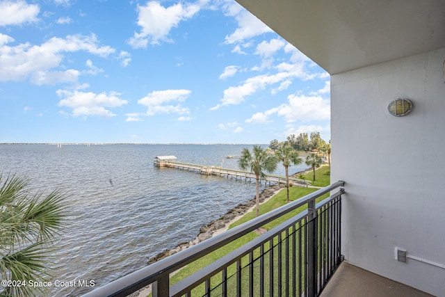 balcony featuring a water view