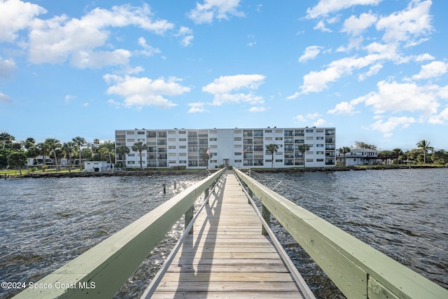 view of dock with a water view