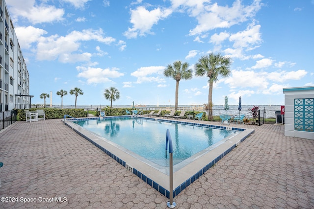 view of pool featuring a patio area