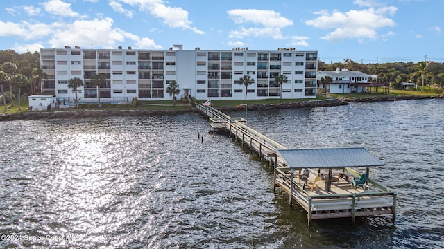 dock area with a water view