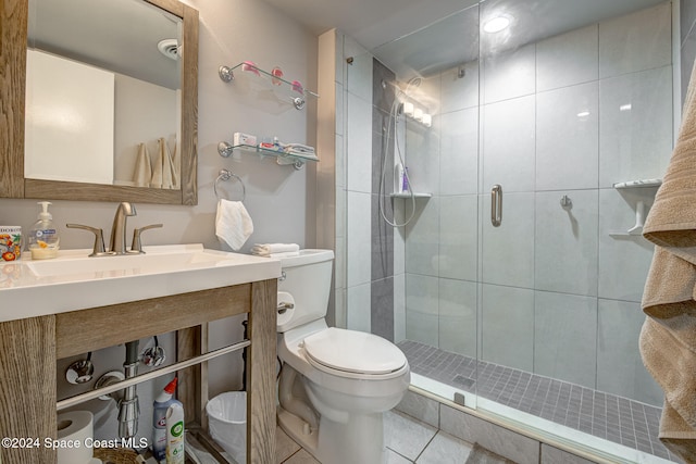 bathroom featuring tile patterned floors, toilet, and walk in shower