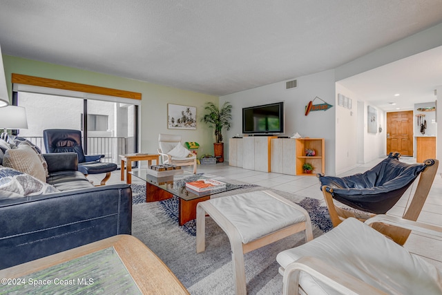 living room featuring light tile patterned floors