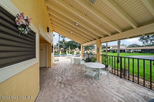 view of patio with a community pool