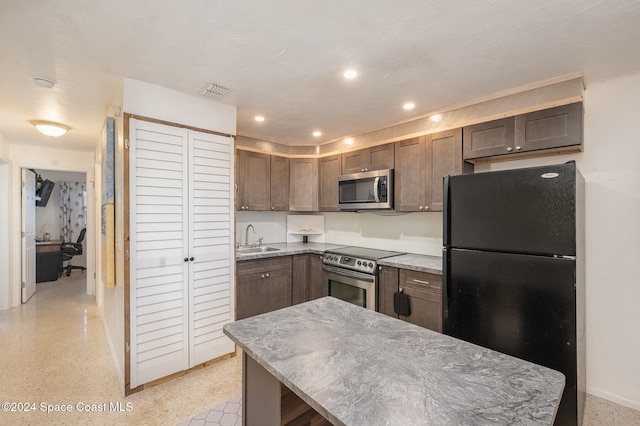 kitchen with sink and stainless steel appliances