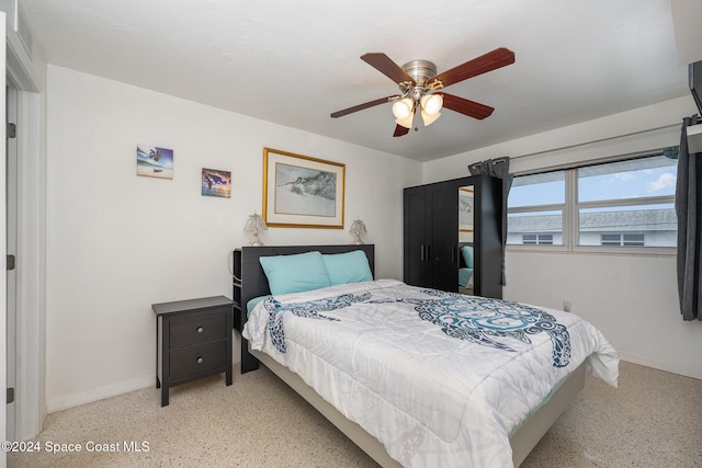 bedroom featuring ceiling fan