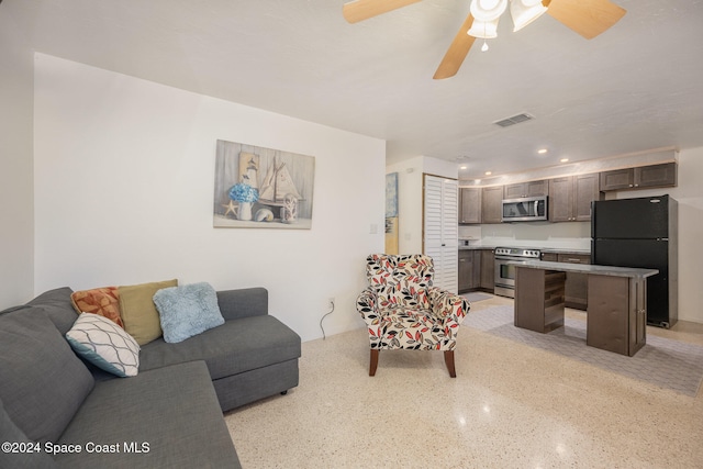 living room featuring ceiling fan