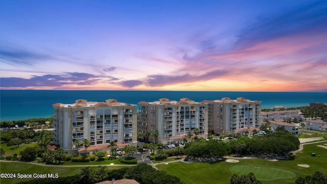 outdoor building at dusk with a water view