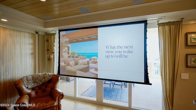 interior space featuring a water view and wood ceiling