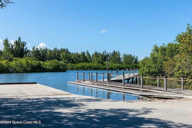 view of dock with a water view