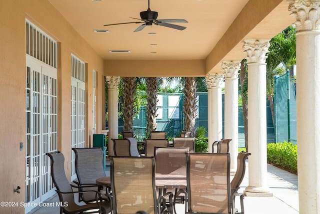 view of patio featuring ceiling fan