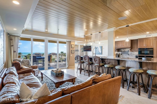 tiled living room with wooden ceiling