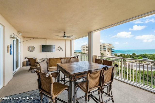 balcony featuring ceiling fan