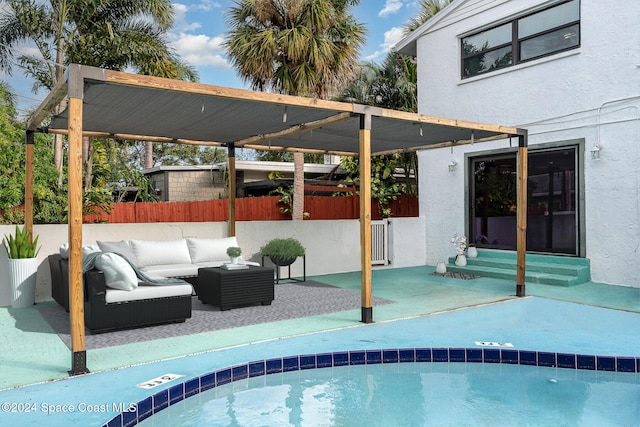 view of pool with a patio area and outdoor lounge area