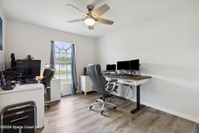 office space featuring hardwood / wood-style flooring and ceiling fan