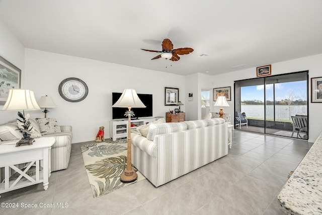 living room featuring ceiling fan