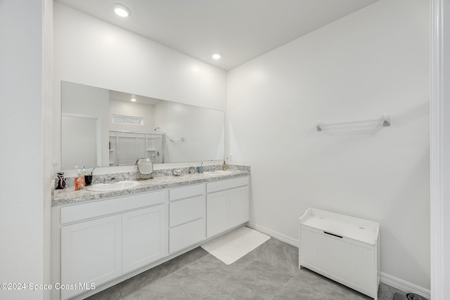 bathroom featuring vanity and walk in shower