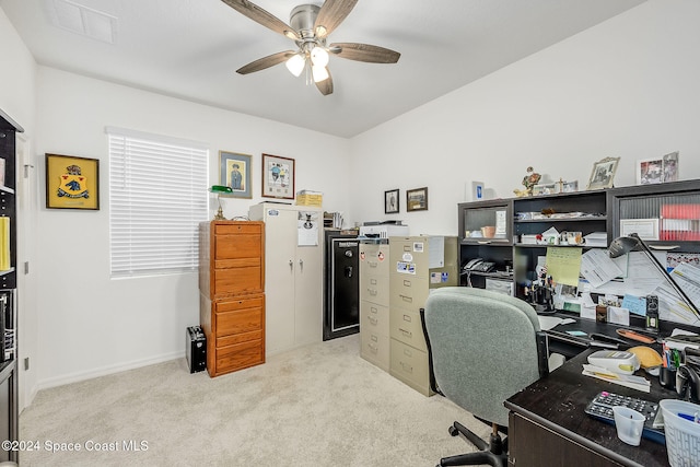 office featuring light carpet and ceiling fan