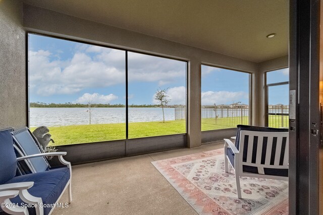 sunroom with a water view