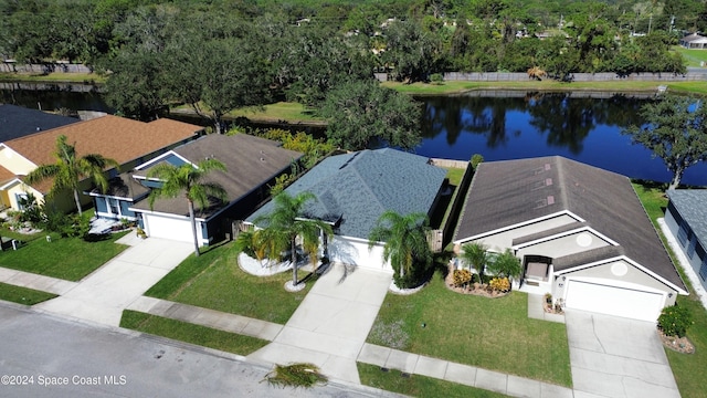 drone / aerial view with a water view